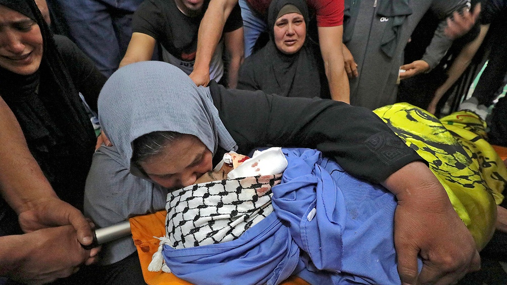 mujer llora muerte de nino palestino telam Sebastian Andres Martino